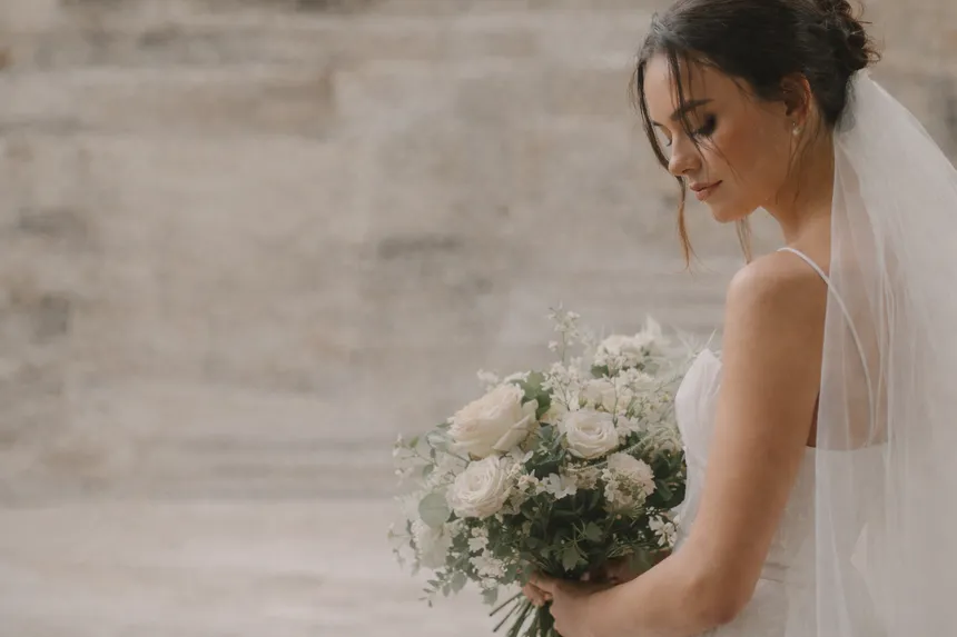 Bride holding white bouquet, wedding photography in South London by Ellie Martinez